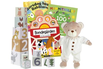 Velkomstgave med stableklosser, bamse og barnebøker